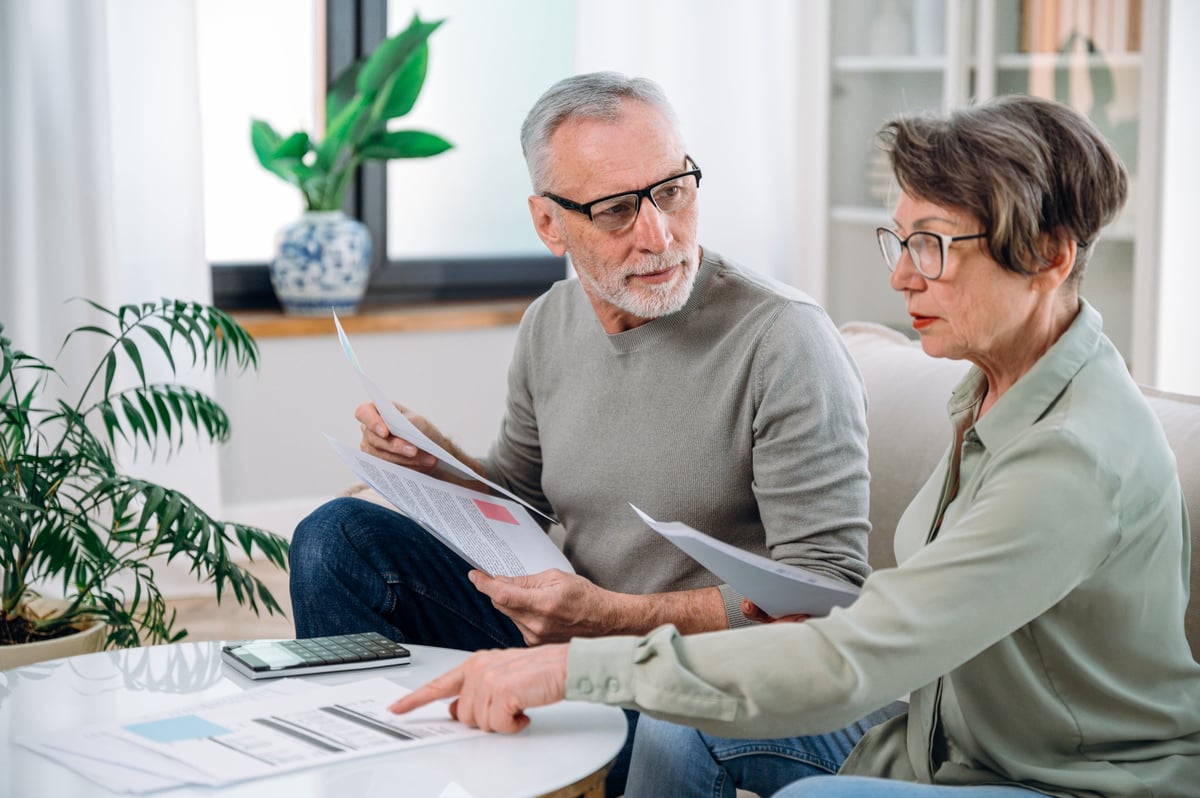 Business owners reviewing their plans and budget together